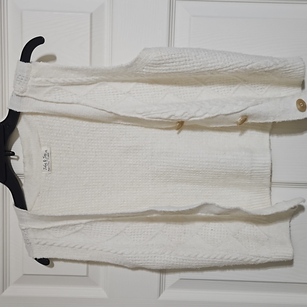 Cream sweater vest size large
